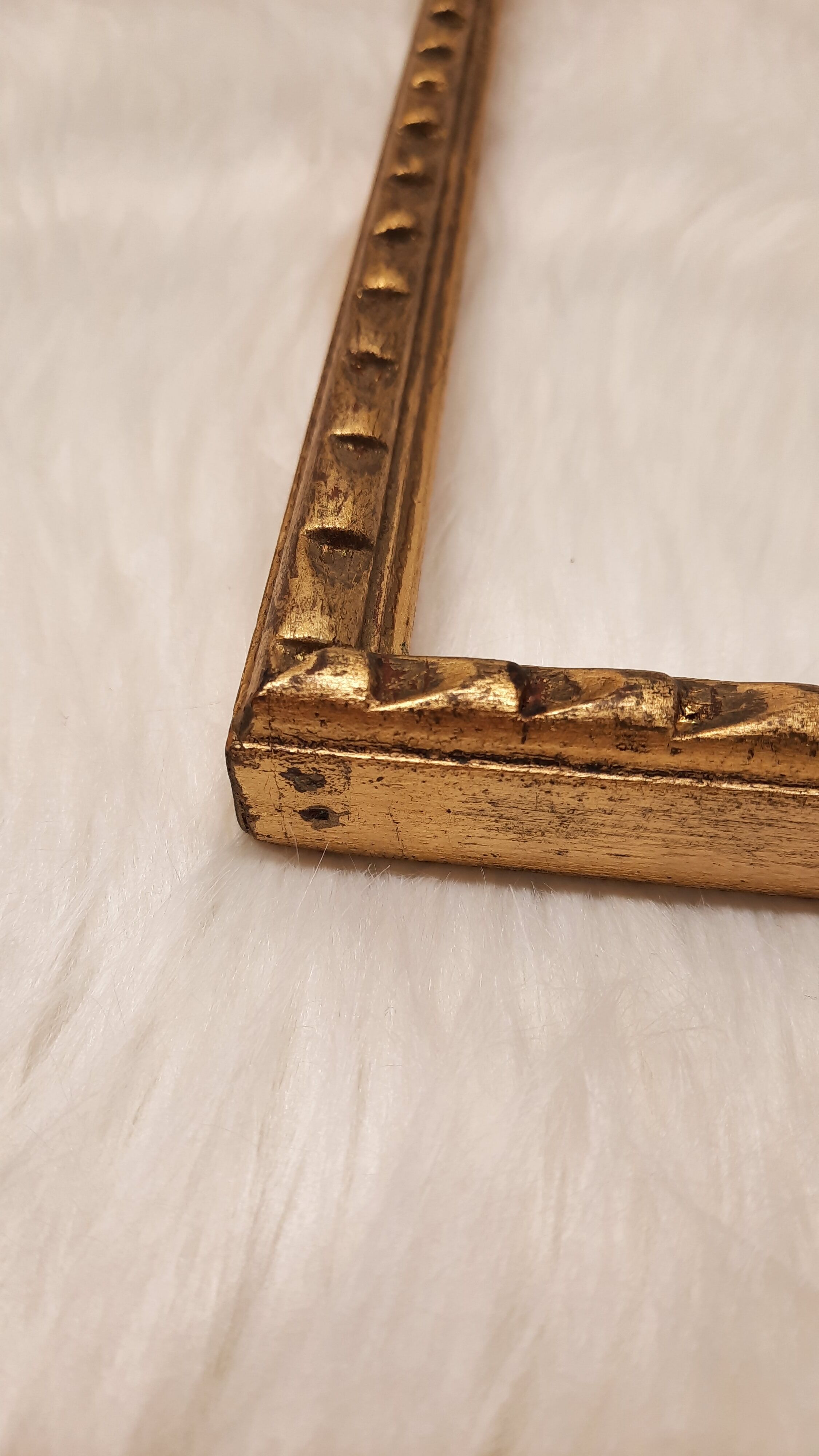 Golden wood frame with godrons