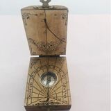 Horizontal diptych sundial with axis wire