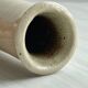 Minimalist beige ceramic vase.