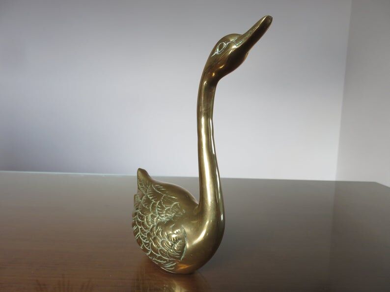 Golden brass swan 70s
