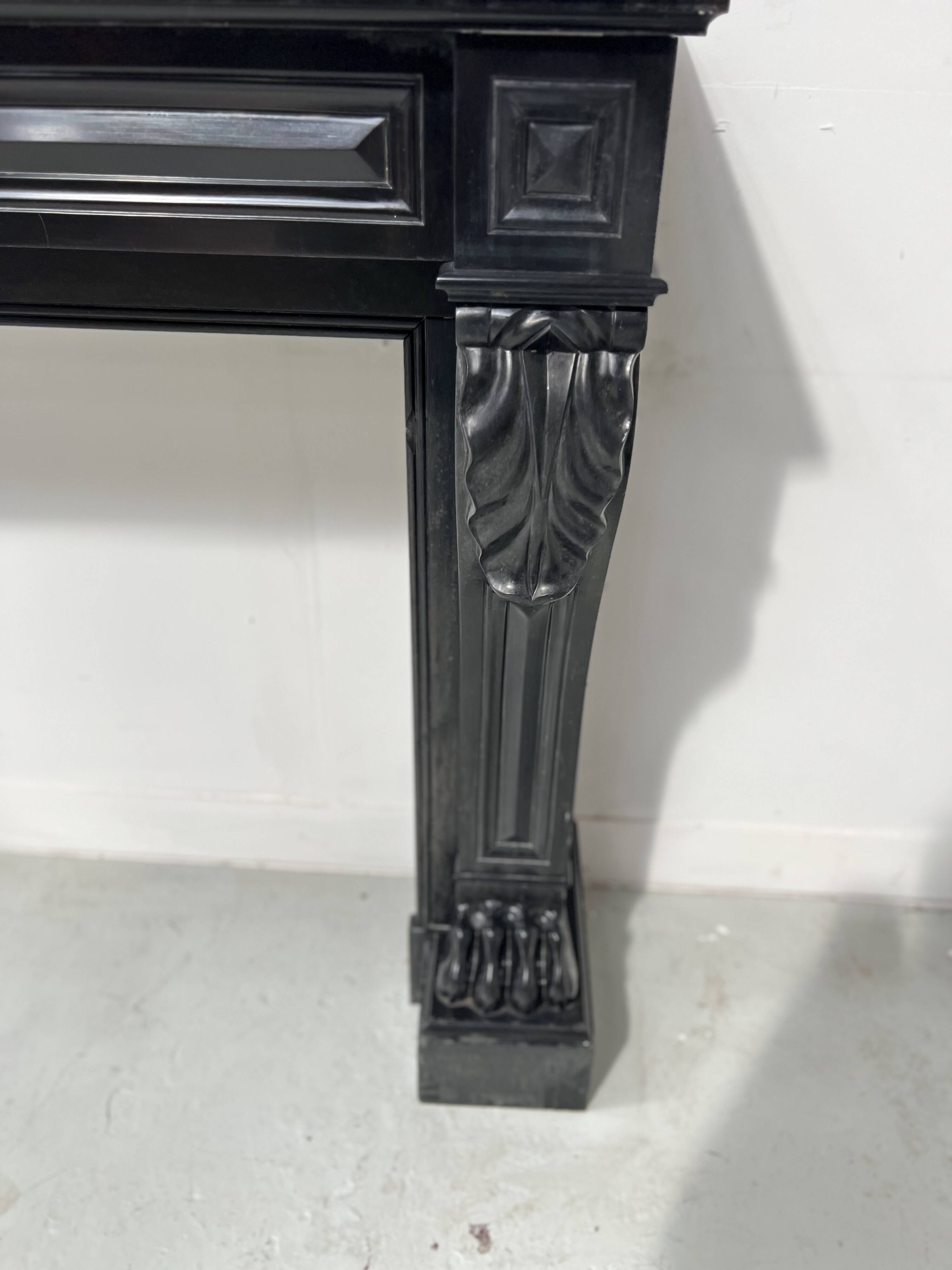 Napoleon III fireplace with claw feet in black marble, 19th century