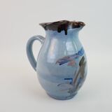 Large blue pitcher with abstract pattern