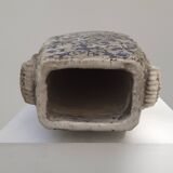 Vase with blue and white enamel on terracotta