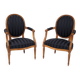 Paire de fauteuils cabriolet de style Louis XVI en bois naturel