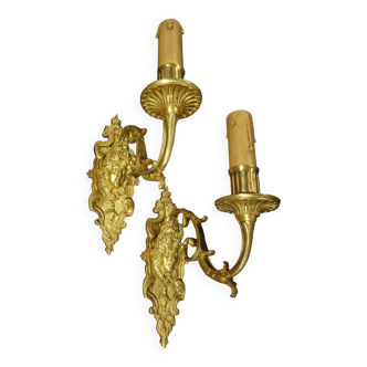 Pair of 19th century Louis XVI style woman's face sconces