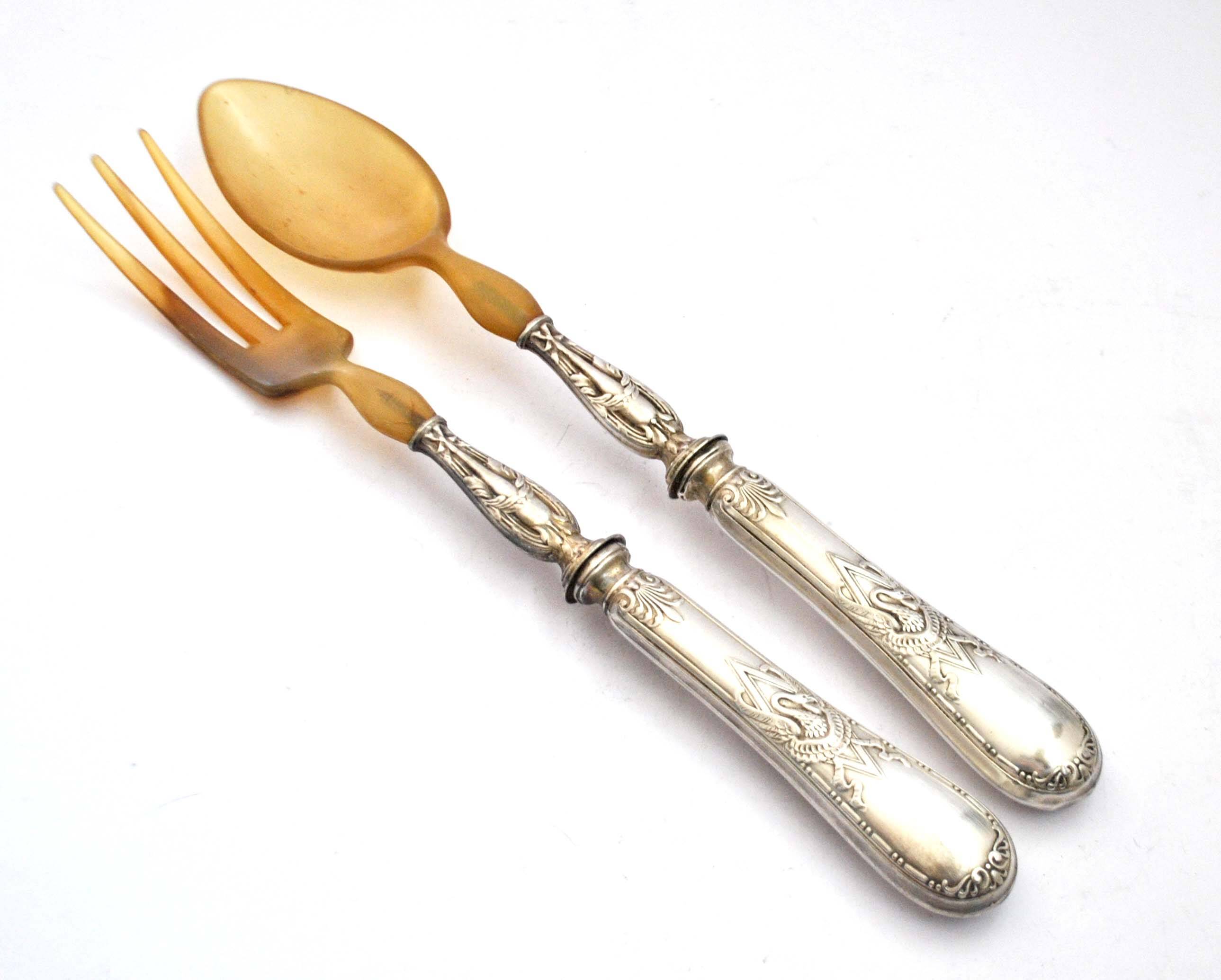 Empire salad server decorated with a swan and napoleon palmette, 19th century.