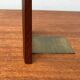 Mid-century Scandinavian bookends in teak and brass.