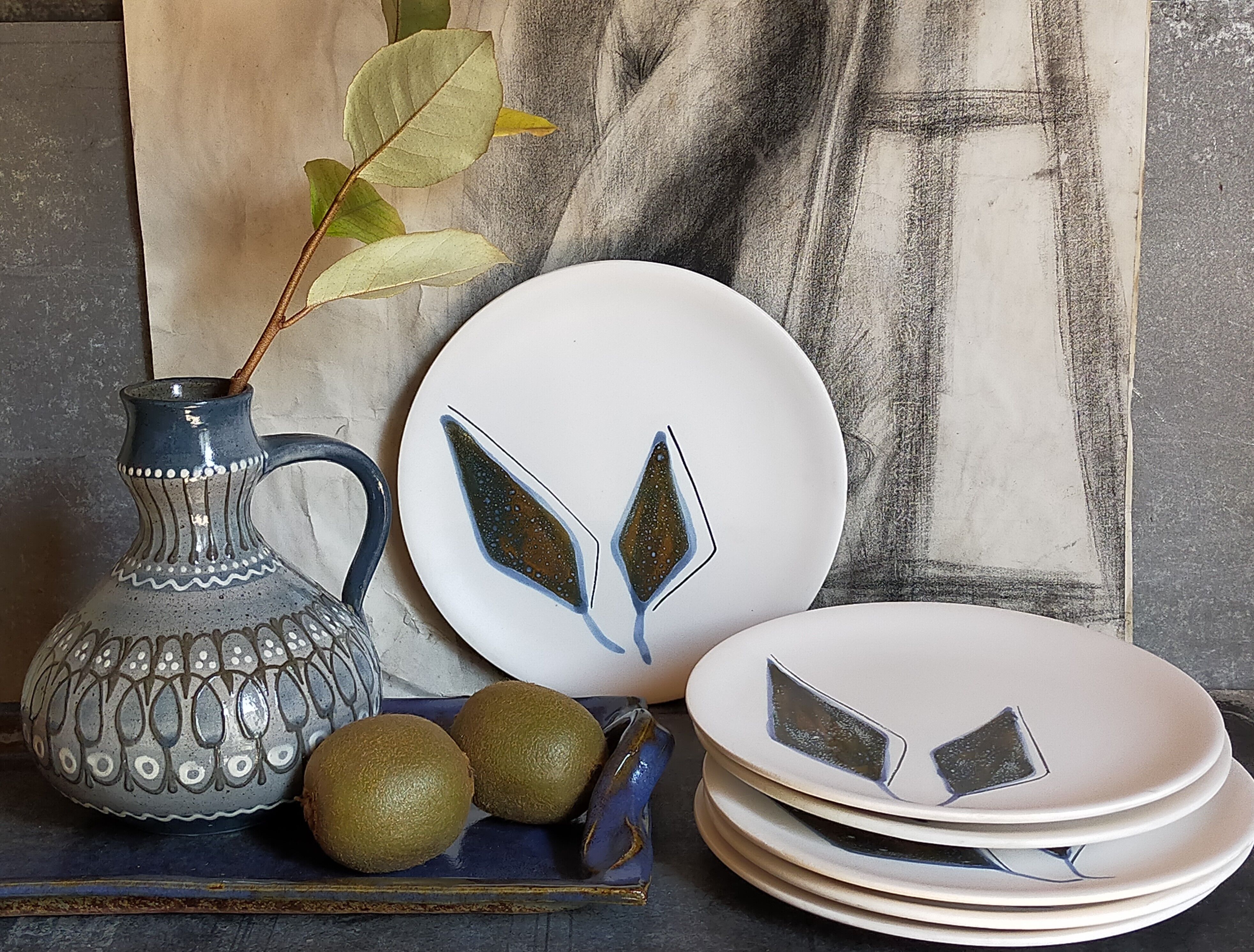 Six ceramic plates with matt enamel 50s