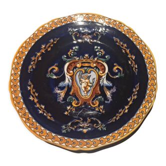 Earthenware plate from Gien. Renaissance model background midnight blue