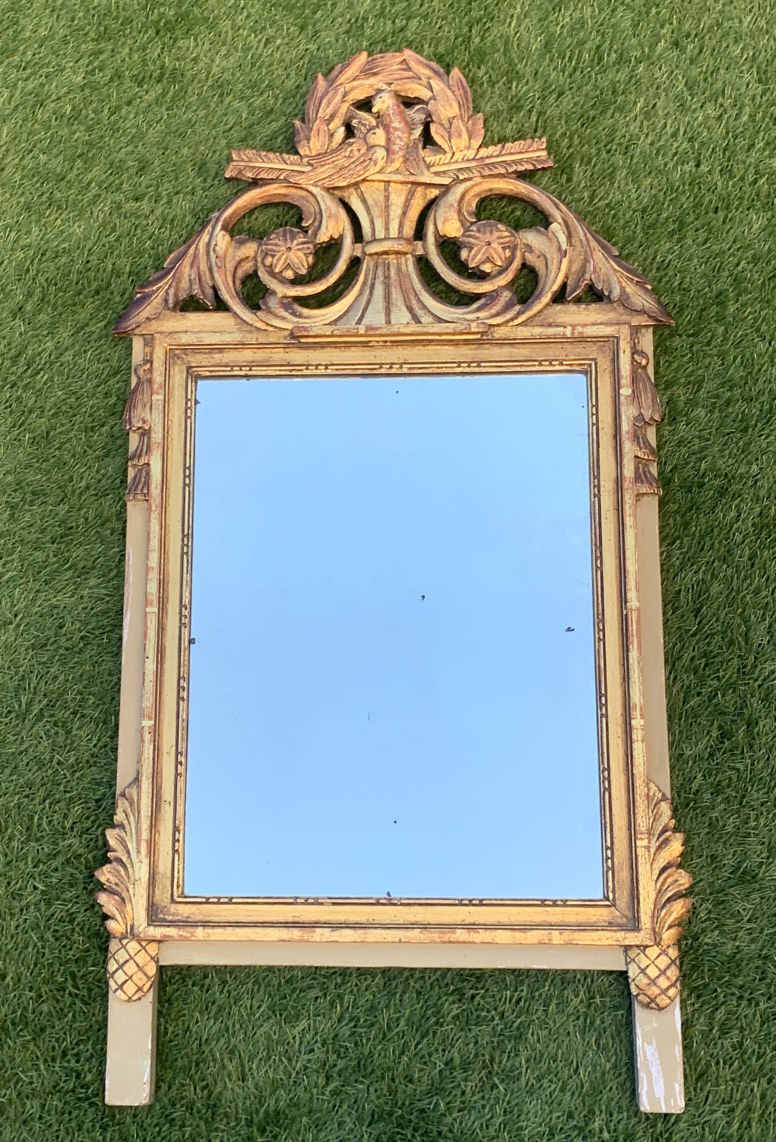 Antique mirror with gilded wood pediment, Louis XVI style