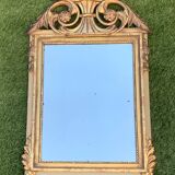 Antique mirror with gilded wood pediment, Louis XVI style