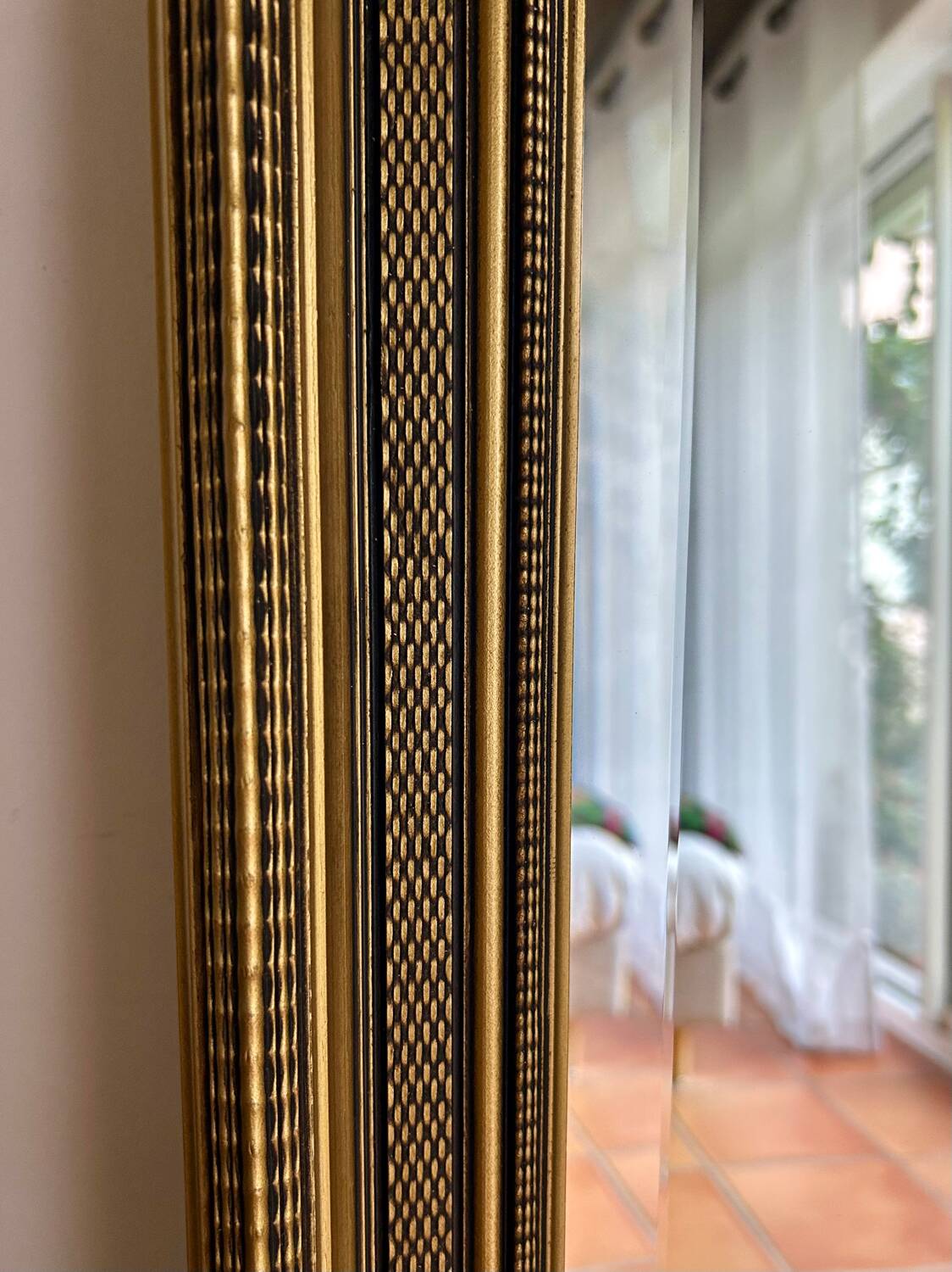 Large antique beveled mirror in the Napoleon III style - Gold and black frame