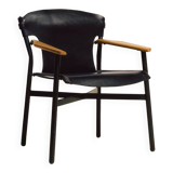 Maërl armchair, Galathée model, black leather, solid wood armrests of your choice
