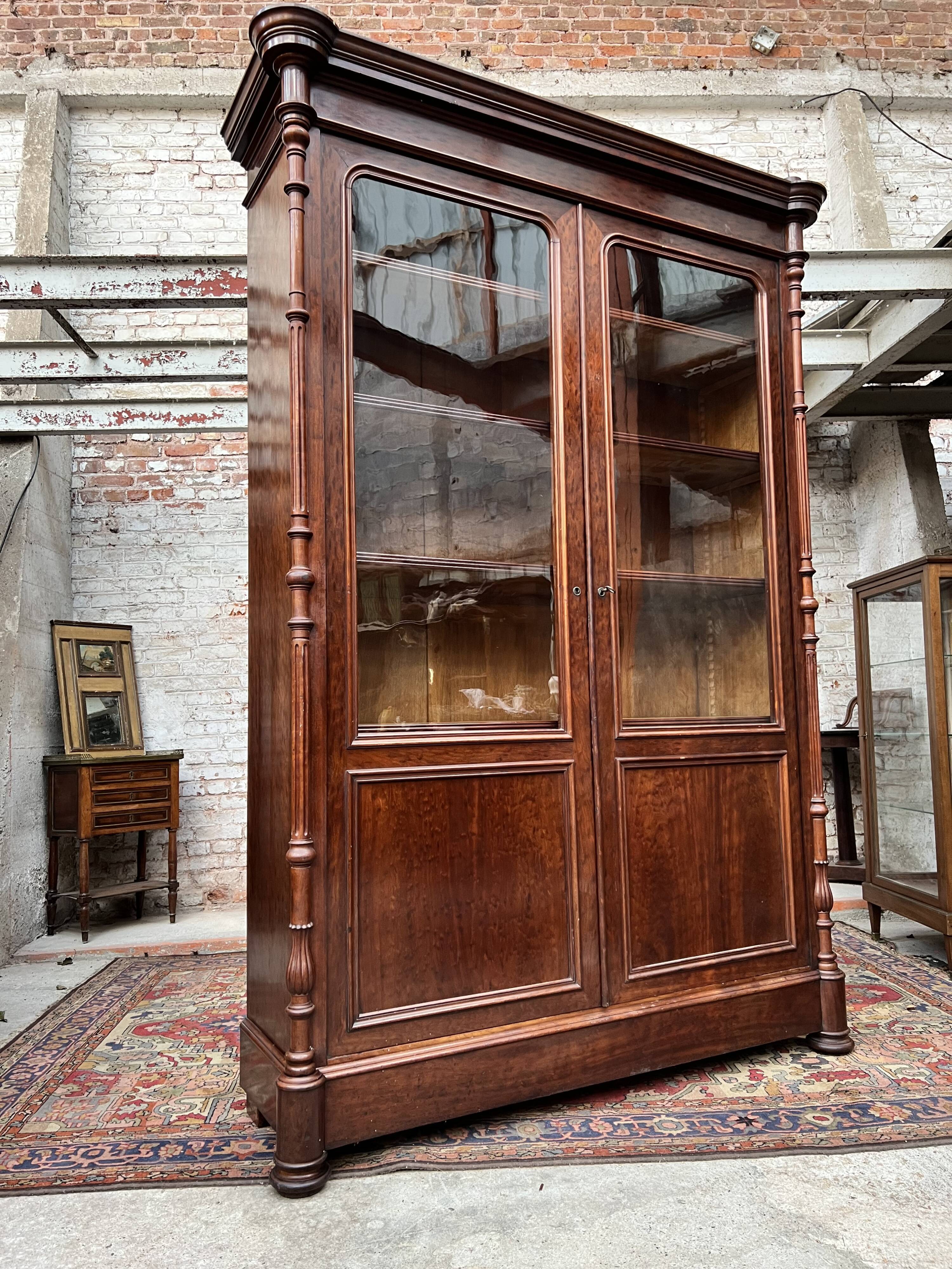 Speckled mahogany bookcase of Napoleon III XIX century