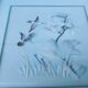 Two vintage paintings made with feathers, hummingbird motif