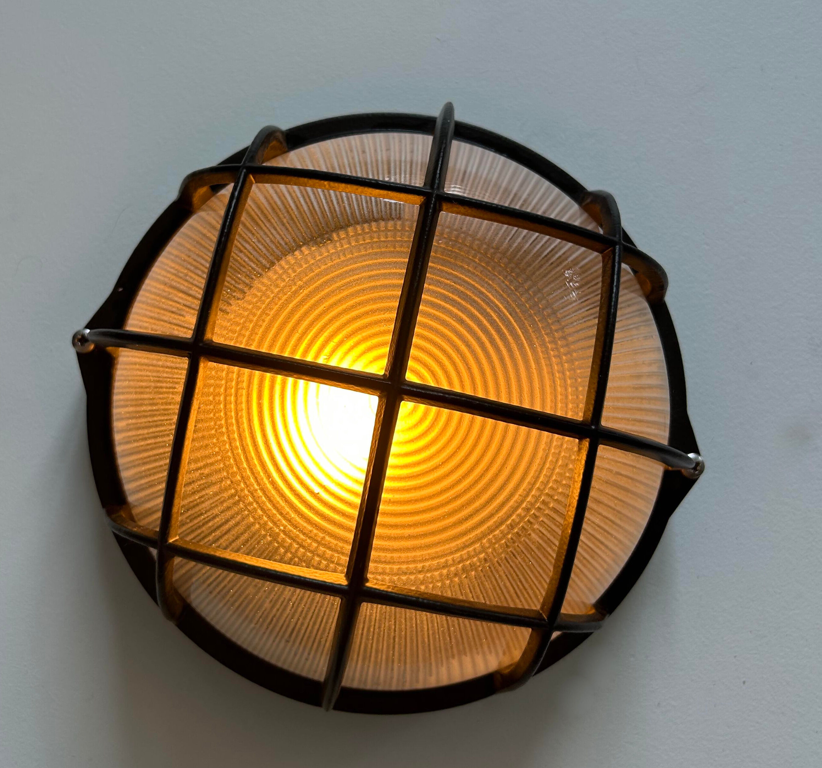 Vintage wall lamp, black metal and ridged glass, France 1980.