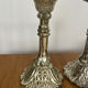 Pair of pressed glass candlesticks with silver plating.