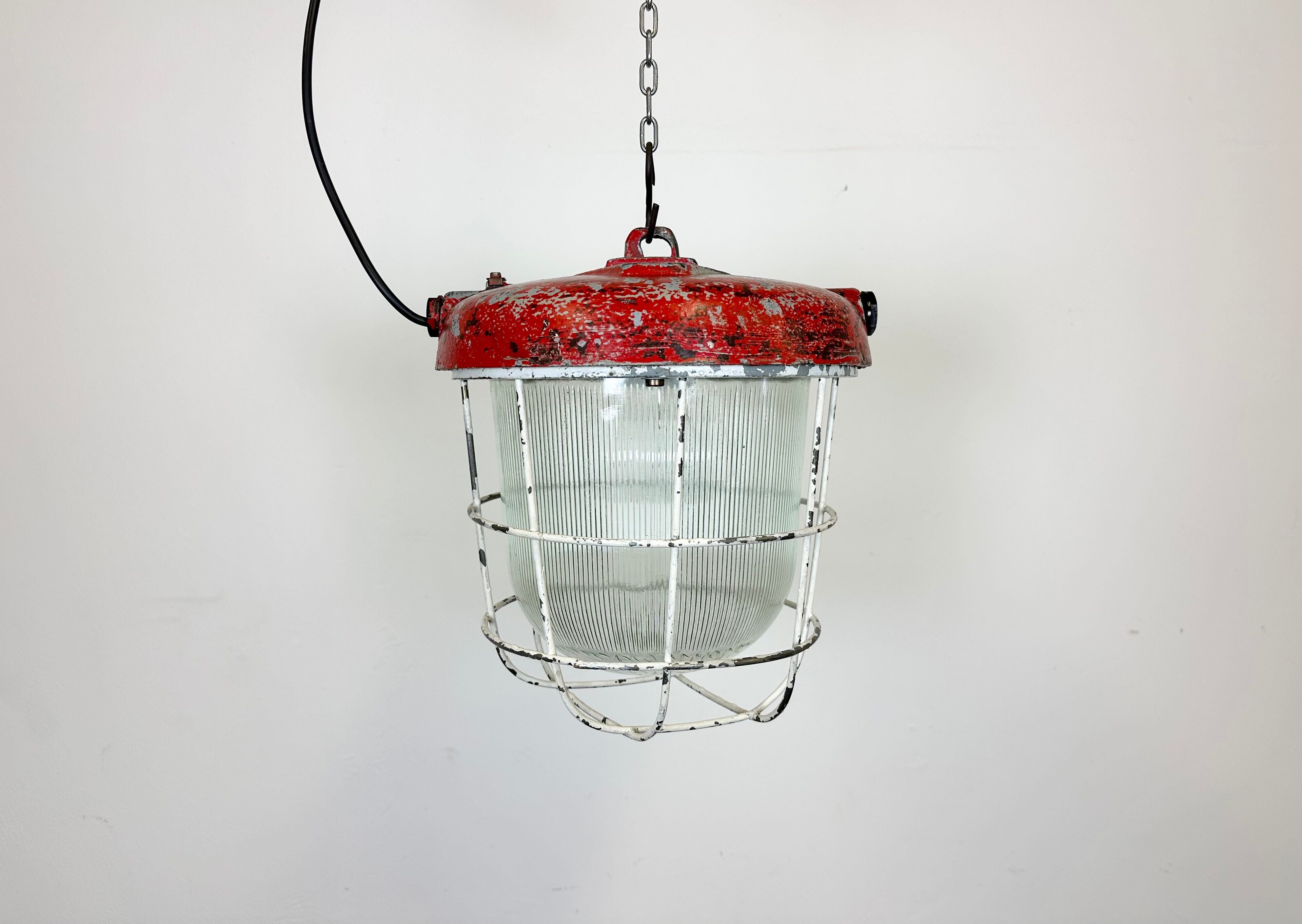 Red industrial cast iron cage pendant light, 1960s