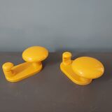 Yellow hooks designer Carlo Bartoli