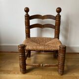Low straw chair