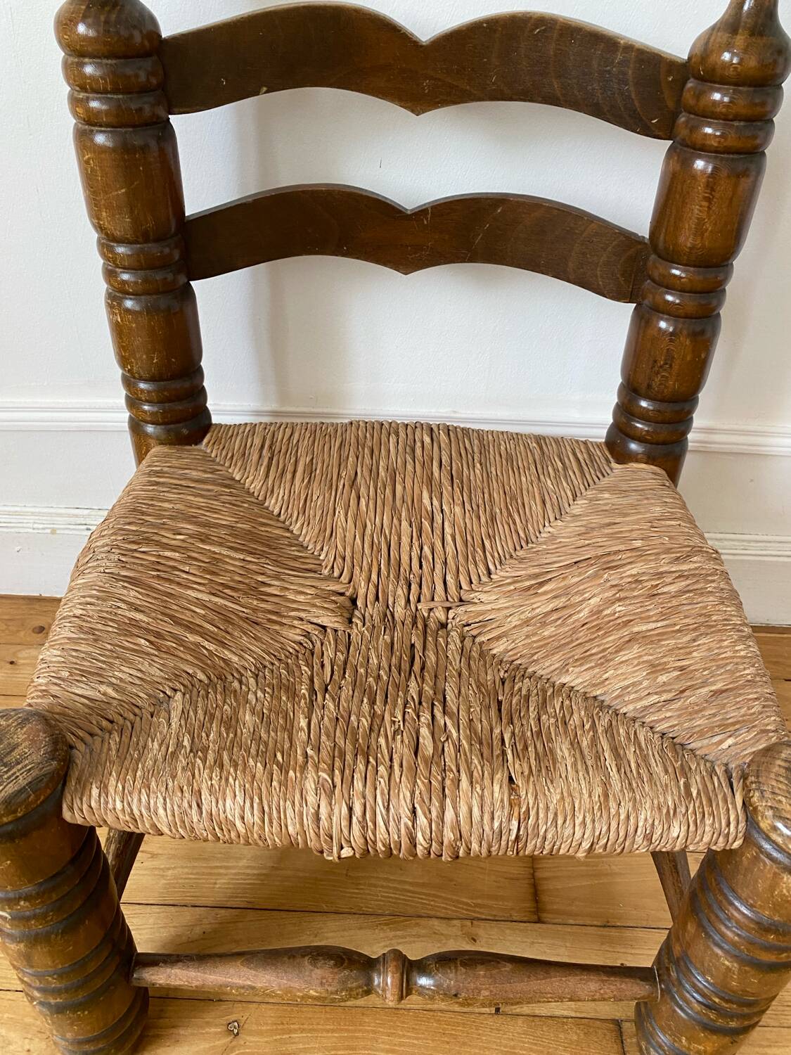 Low fireplace chair in the style of Charles Dudouyt