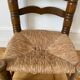 Low fireplace chair in the style of Charles Dudouyt