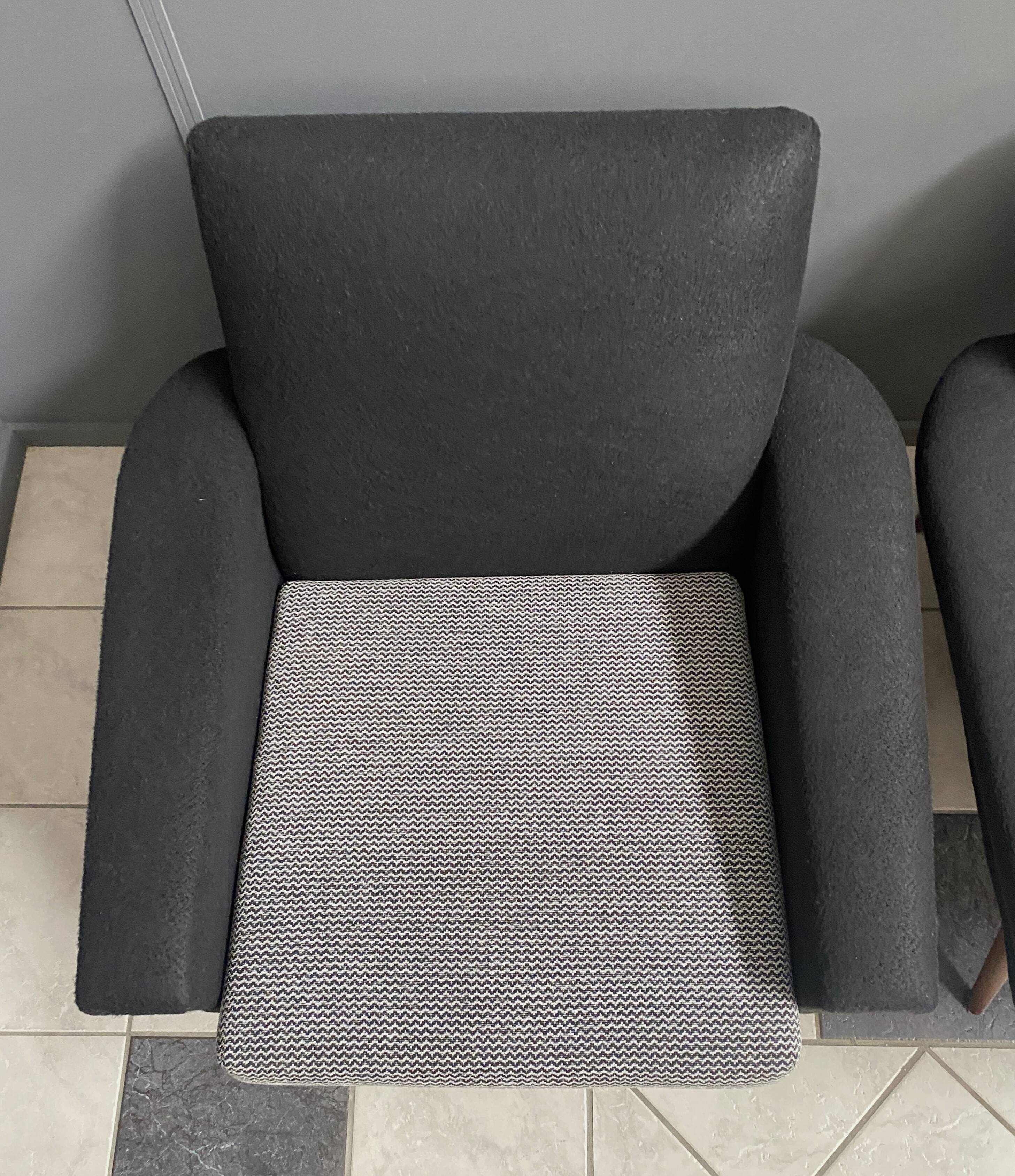 set of two black and white arm chairs 1960s
