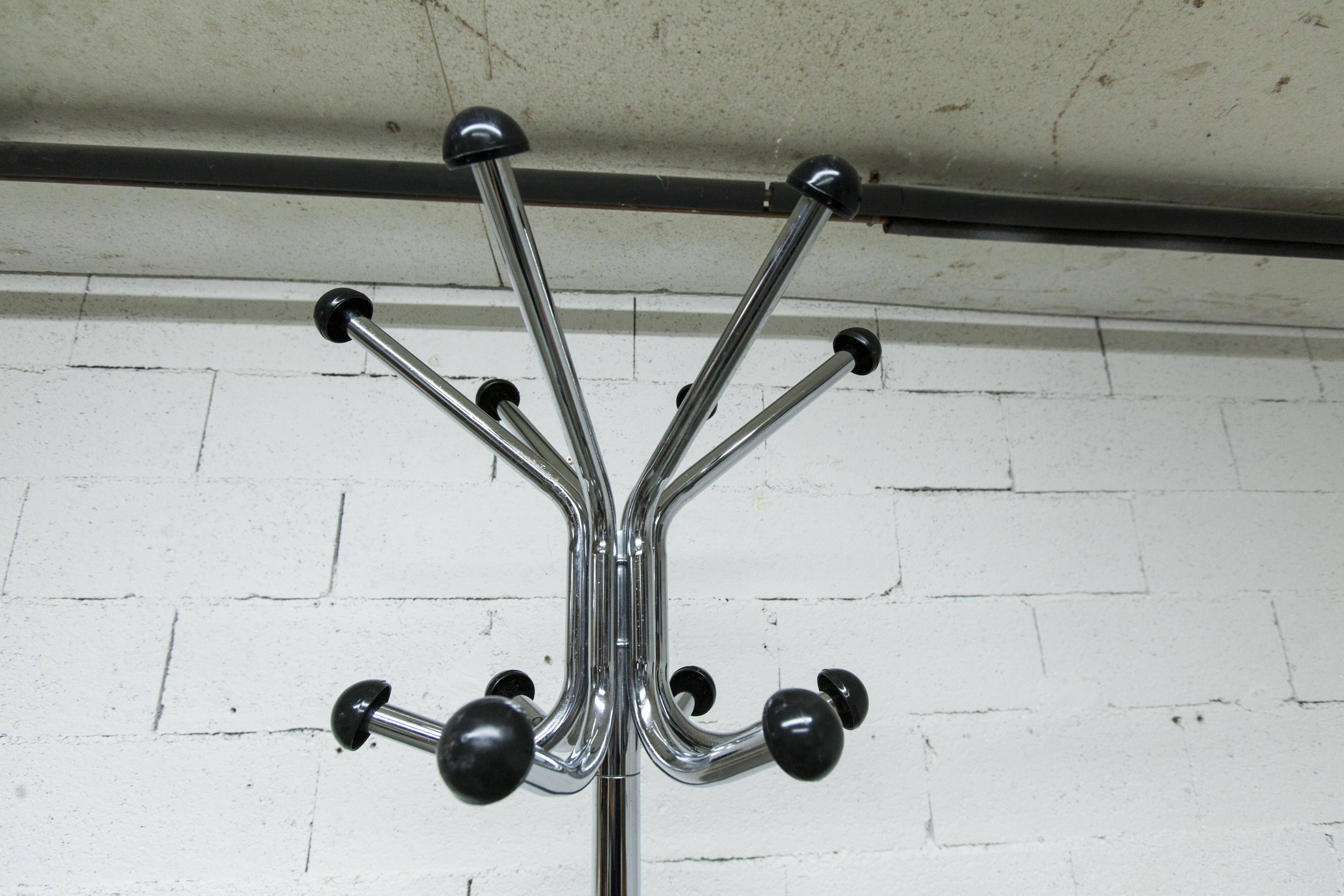 Coat rack with 12 chrome and black plastic hooks, 1960, 2m.