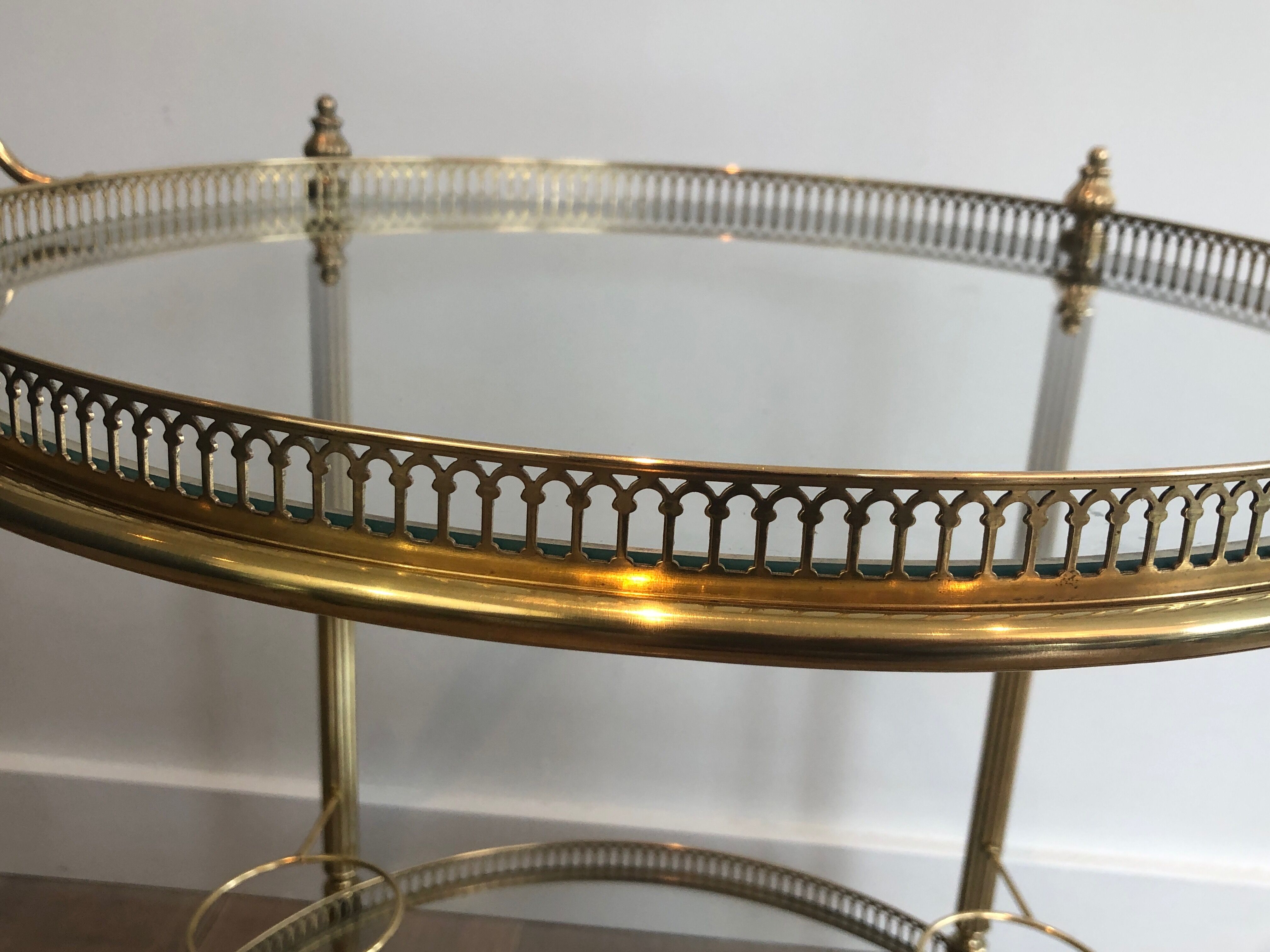 Neoclassical style rolling table in brass