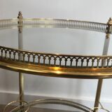 Neoclassical style rolling table in brass