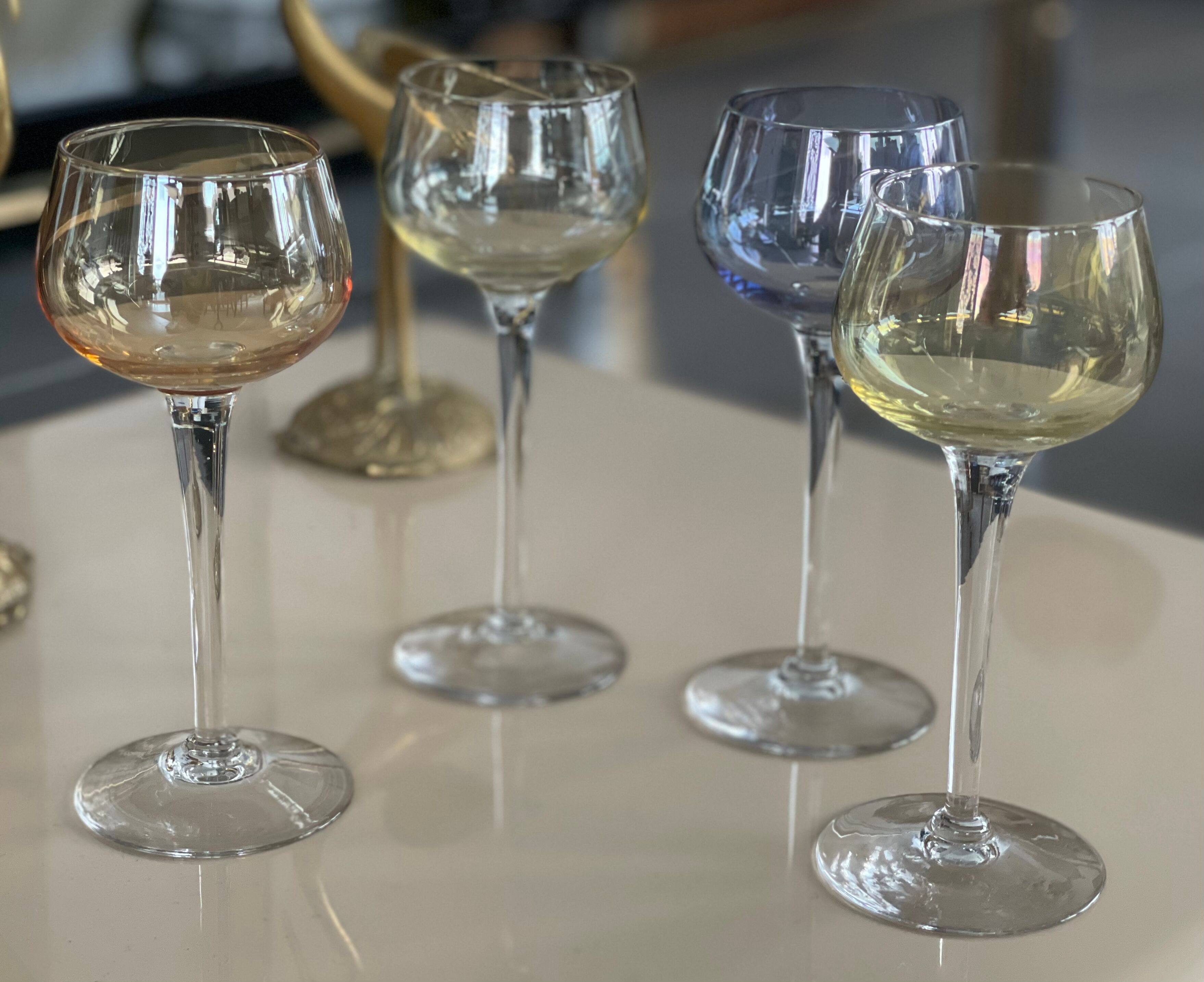 7 vintage iridescent foot glasses