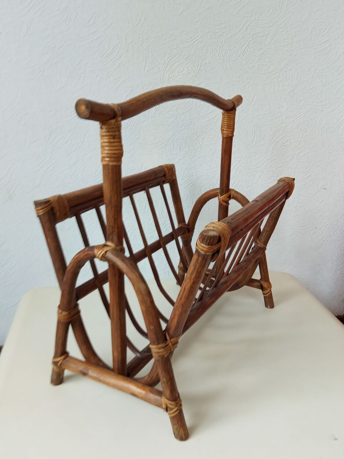 Vintage rattan magazine holder