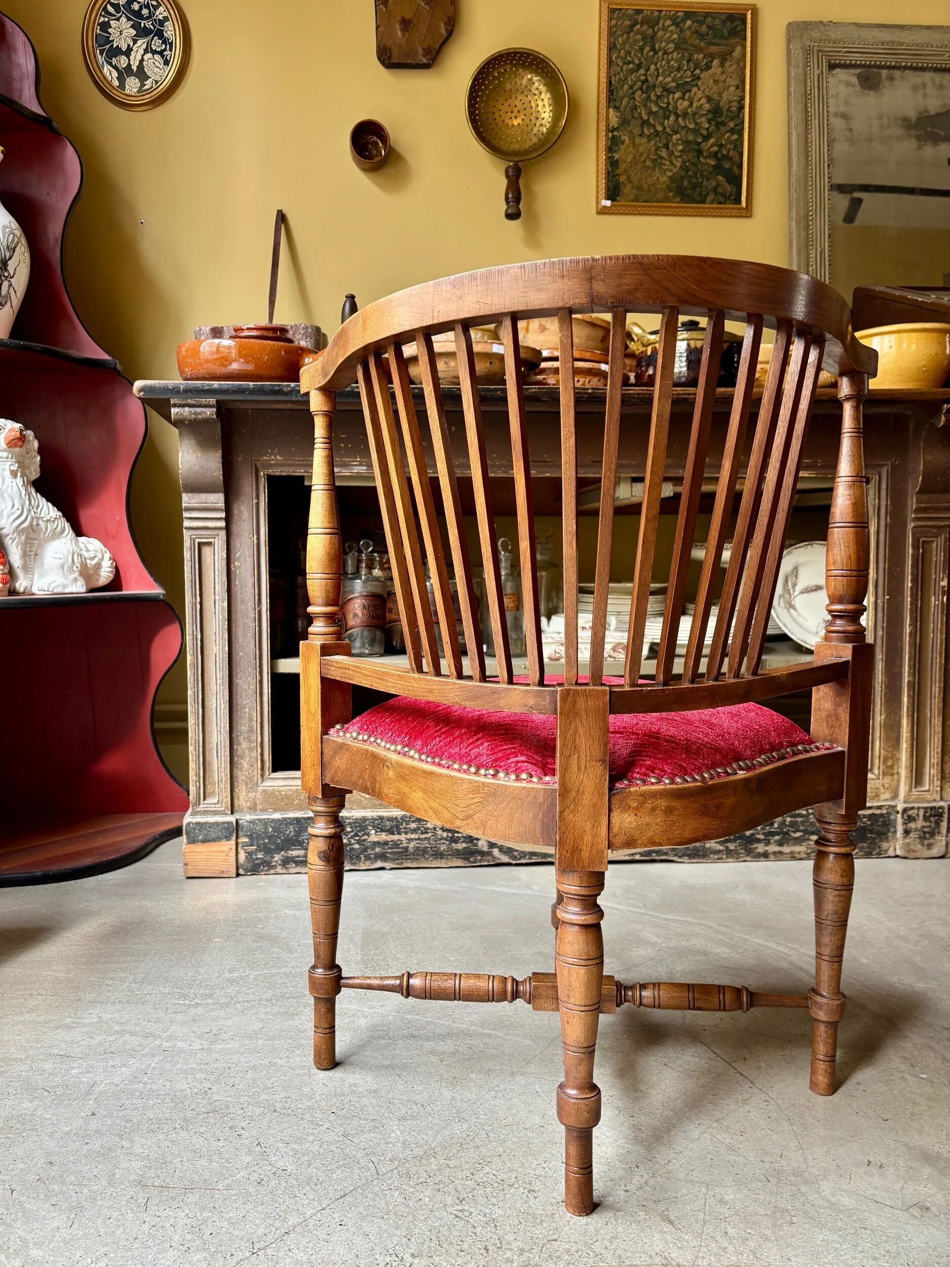 Corner armchair, dark wood and red velvet office chair.