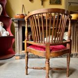 Corner armchair, dark wood and red velvet office chair.