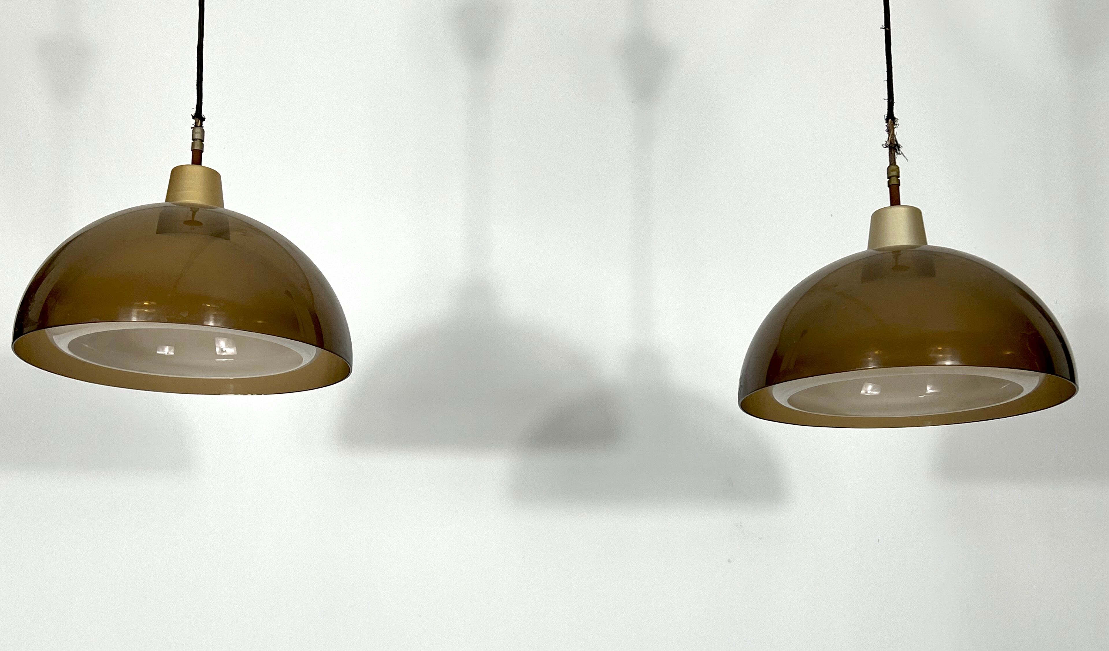 Mid-century modern pair of plexiglass chandelier by Candle