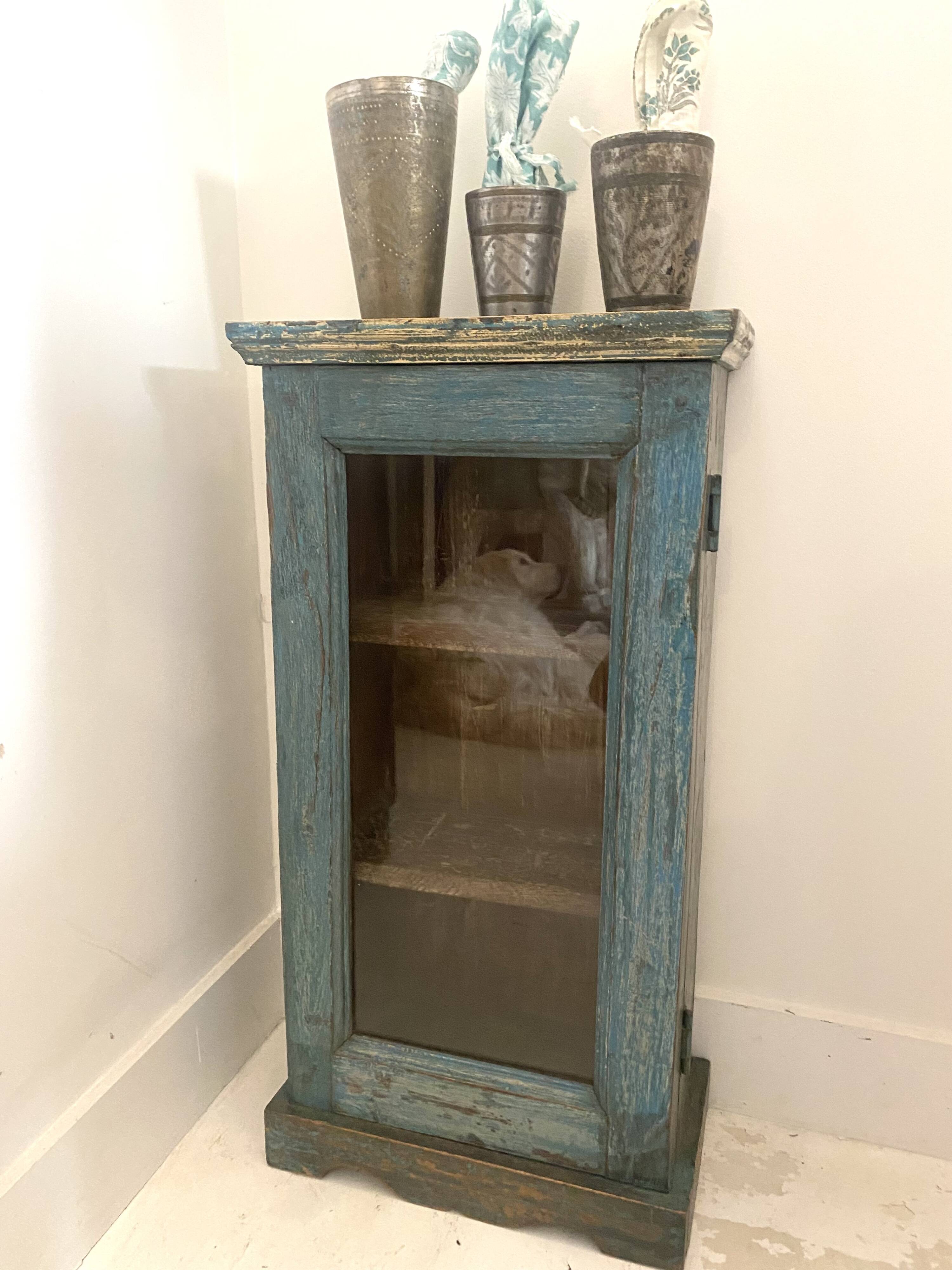 Small wall display case in blue lacquered teak