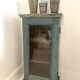 Small wall display case in blue lacquered teak