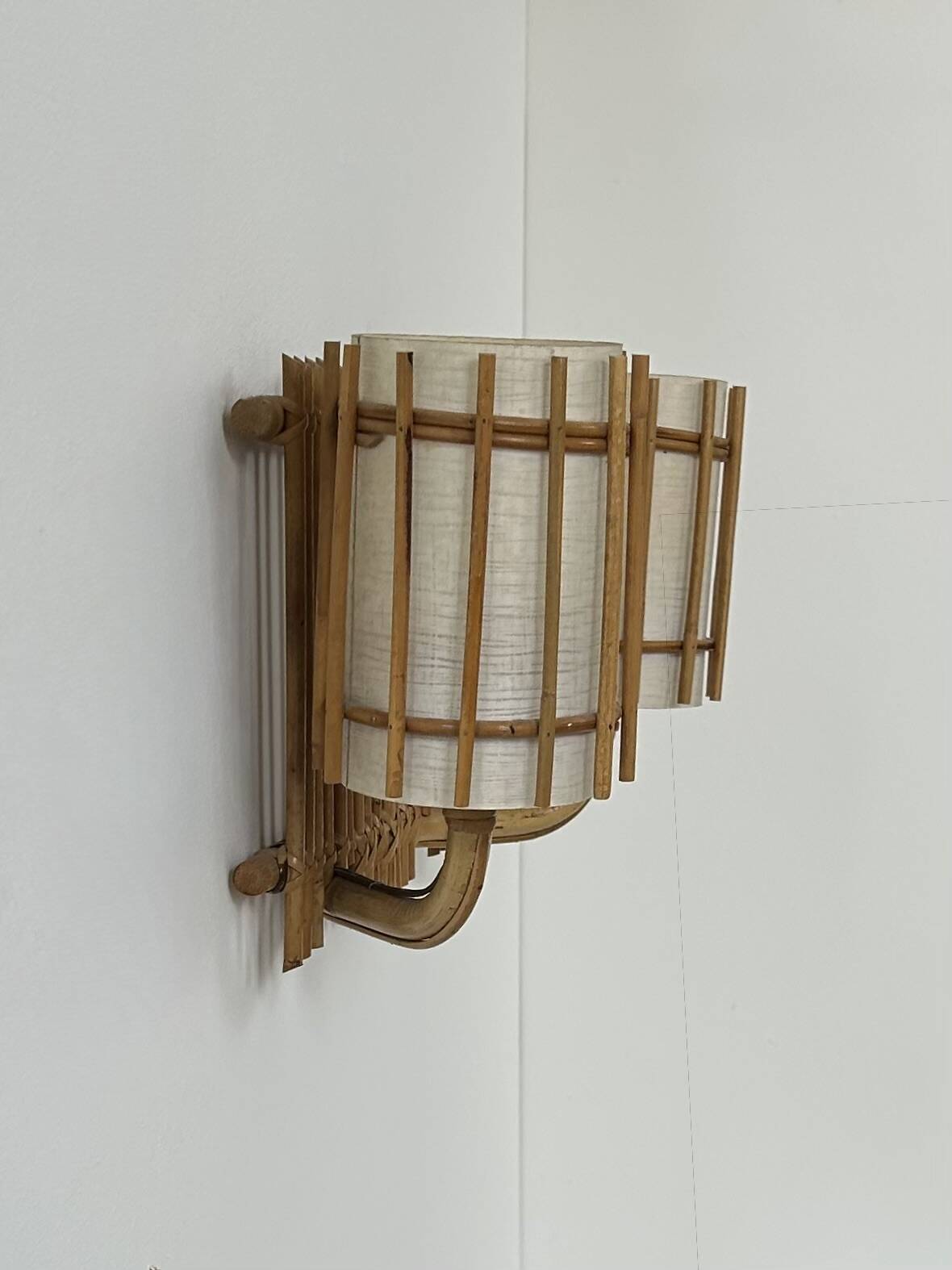Double vintage wall light in rattan, France, 1950.