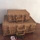 Wicker suitcase.
