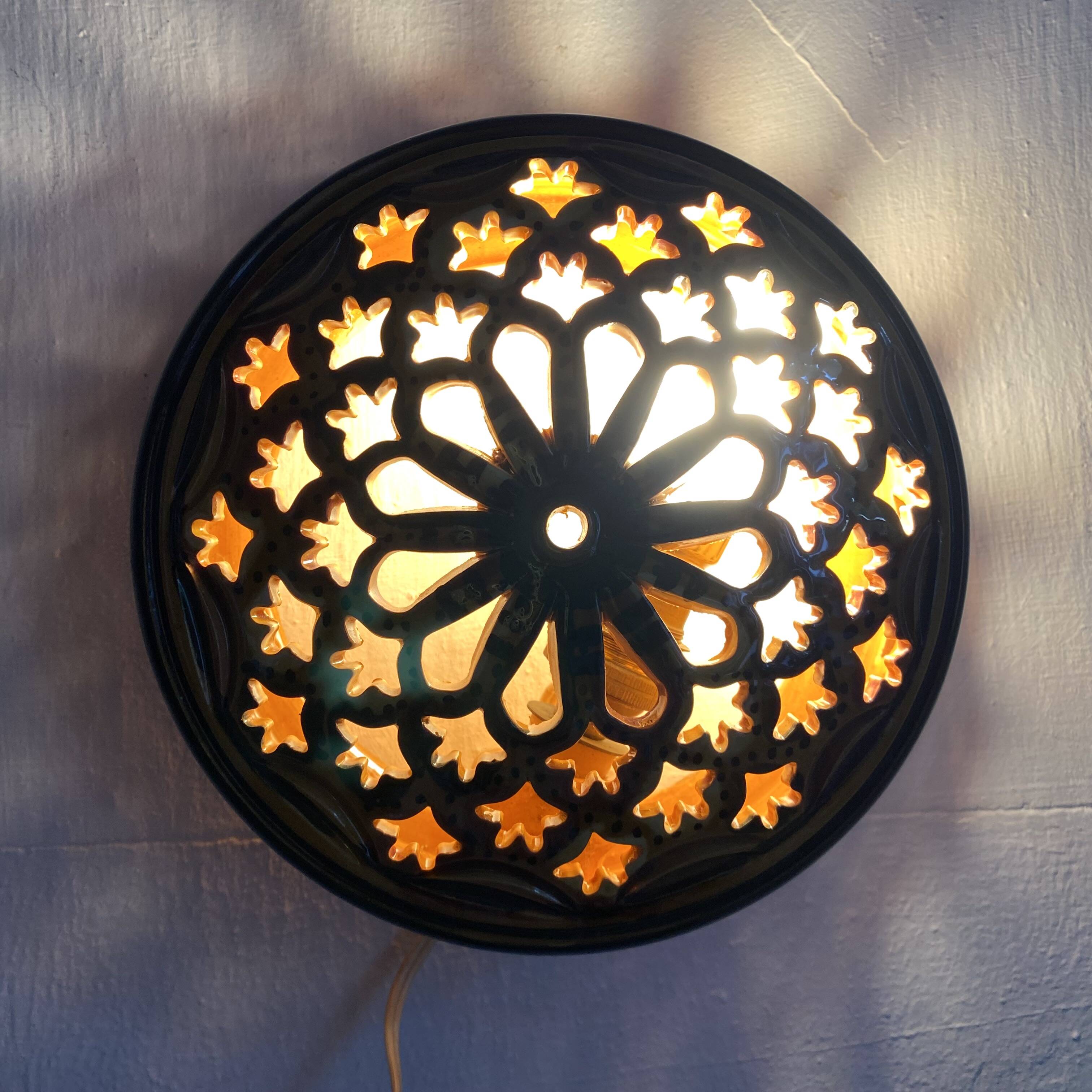 Pair of enamelled terracotta wall lights