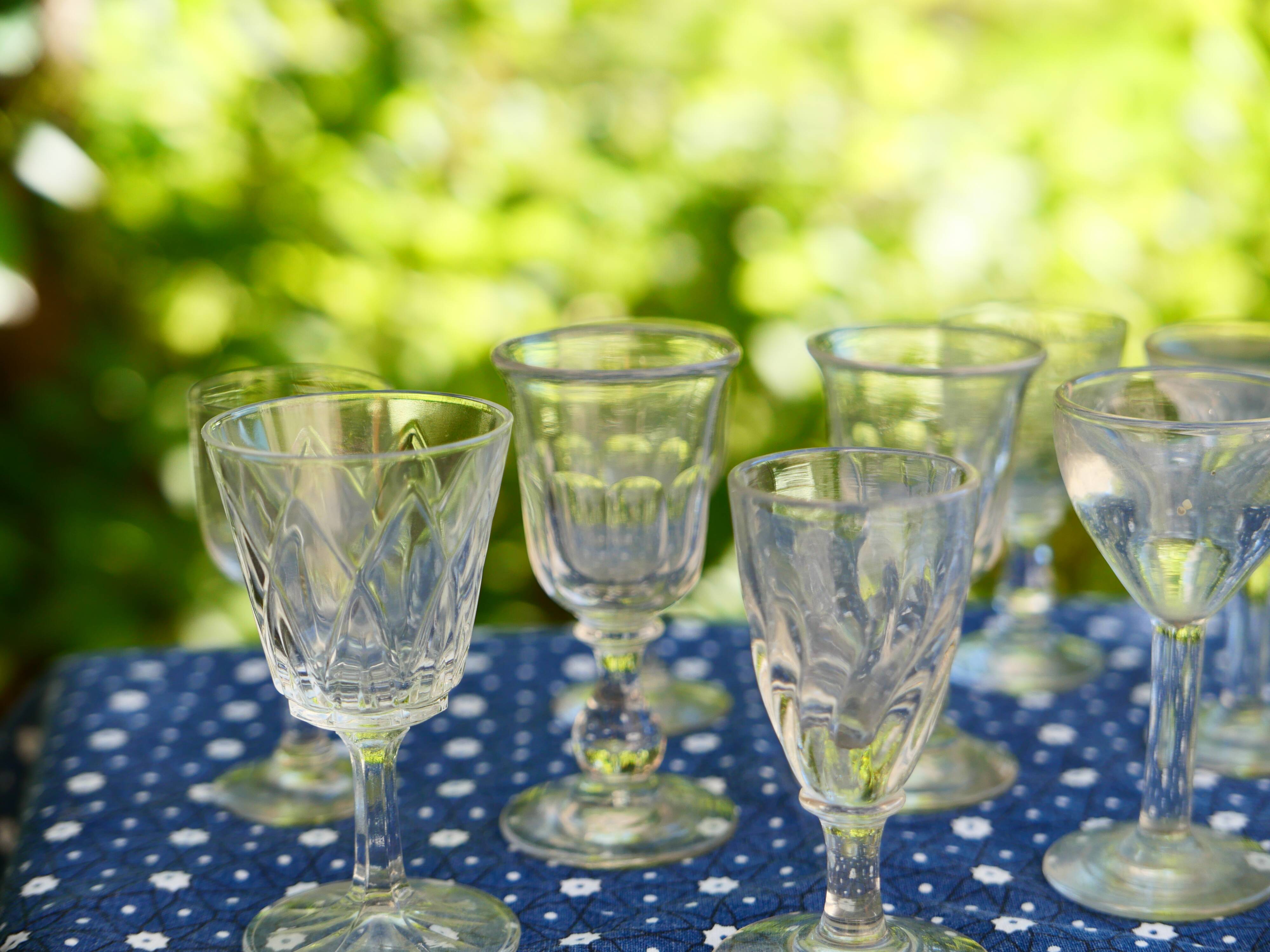 Assortment of 15 mismatched vintage liqueur glasses