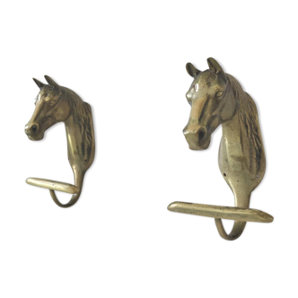 Pair of brass horsehead patères