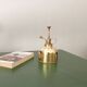 Vintage vaporizer in golden brass 70s