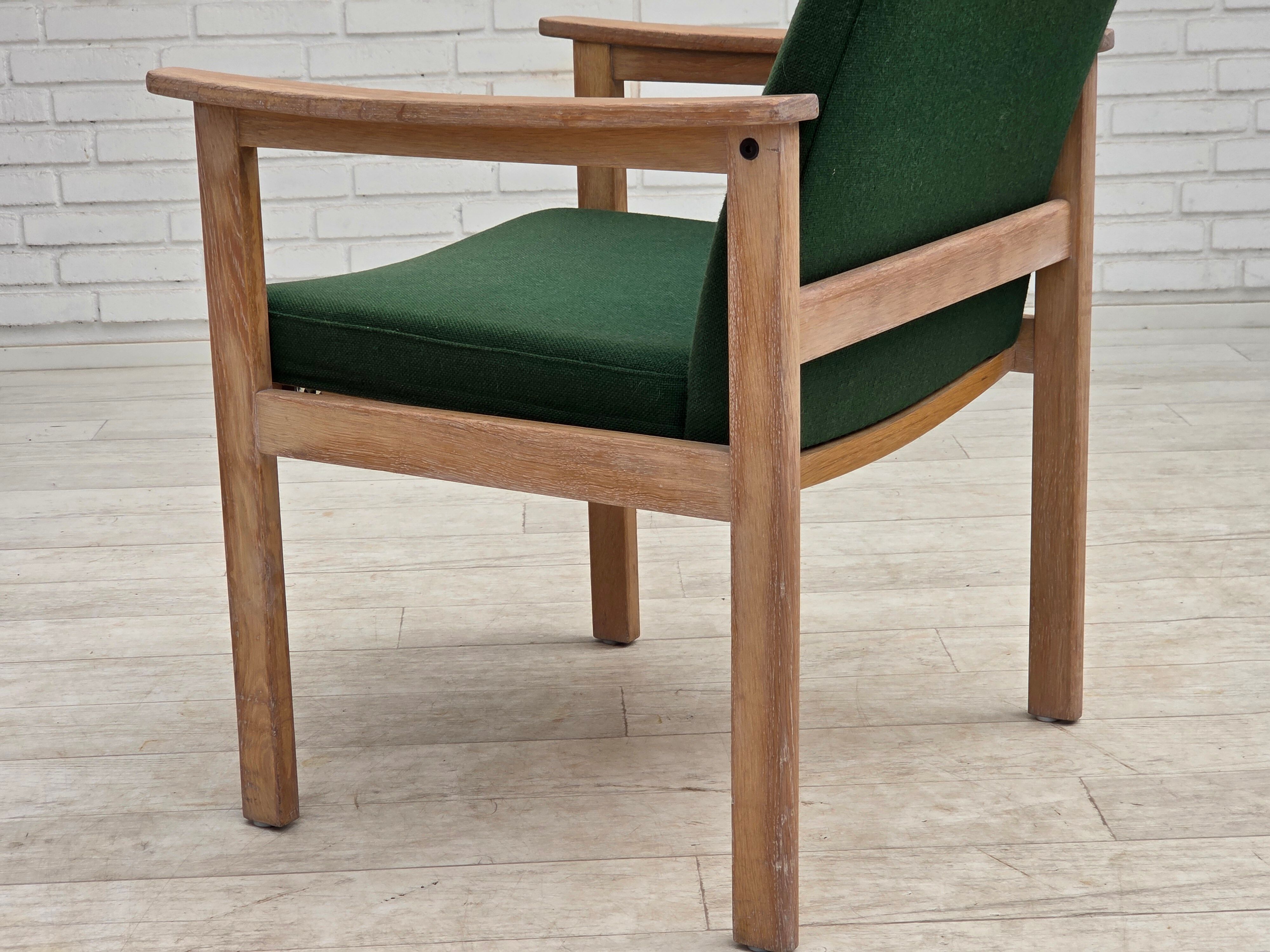 1980s, Danish armchair by Høng Stole, green furniture wool, oak wood.