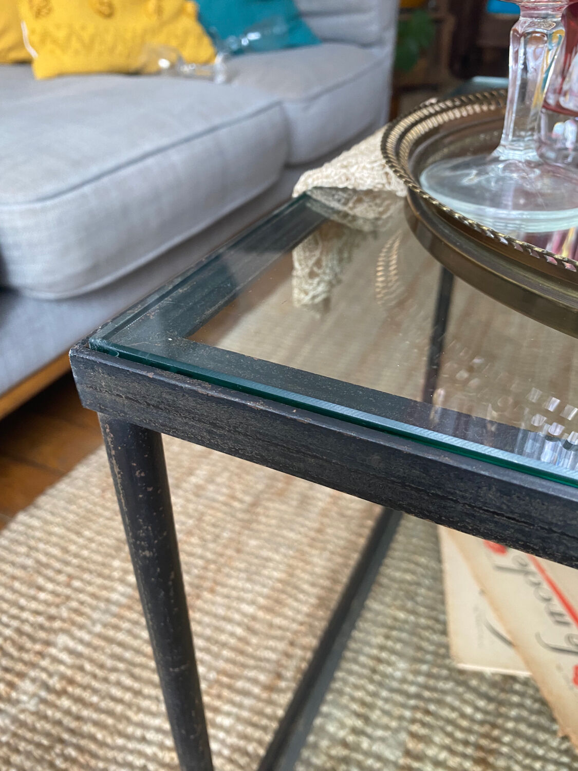 Glass and wrought iron coffee table design