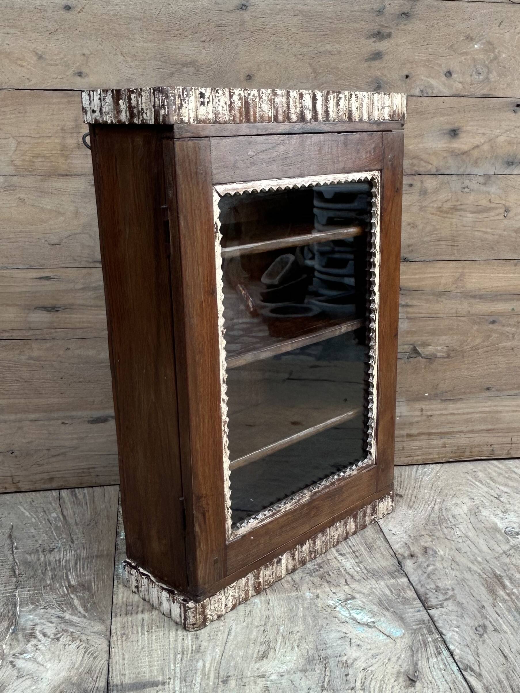 Art Deco wall display cabinet in Burmese teak with original patina.