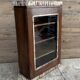 Art Deco wall display cabinet in Burmese teak with original patina.