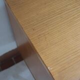 1970s low furniture in wood and metal with sliding doors.