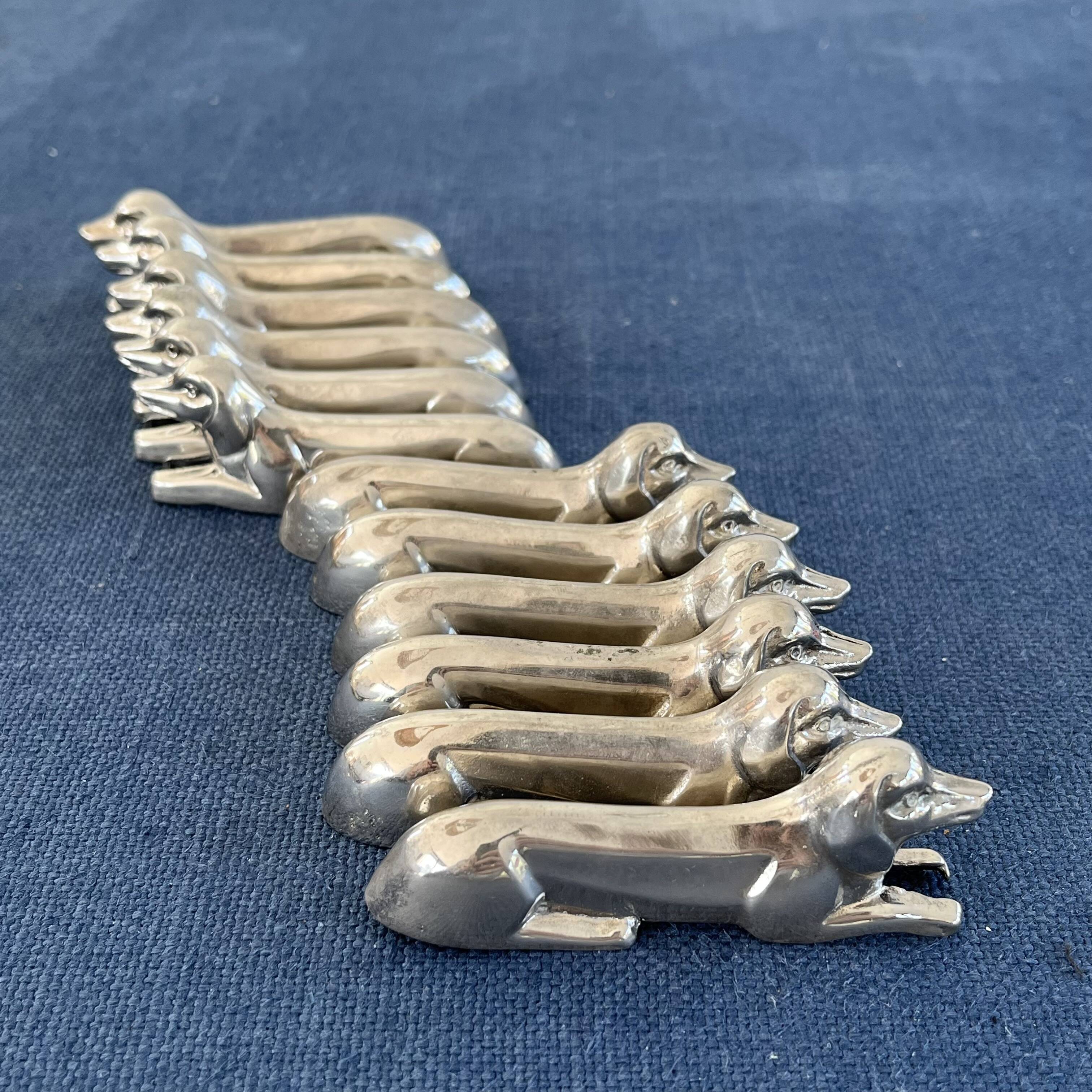 12 metal dachshund knife rests
