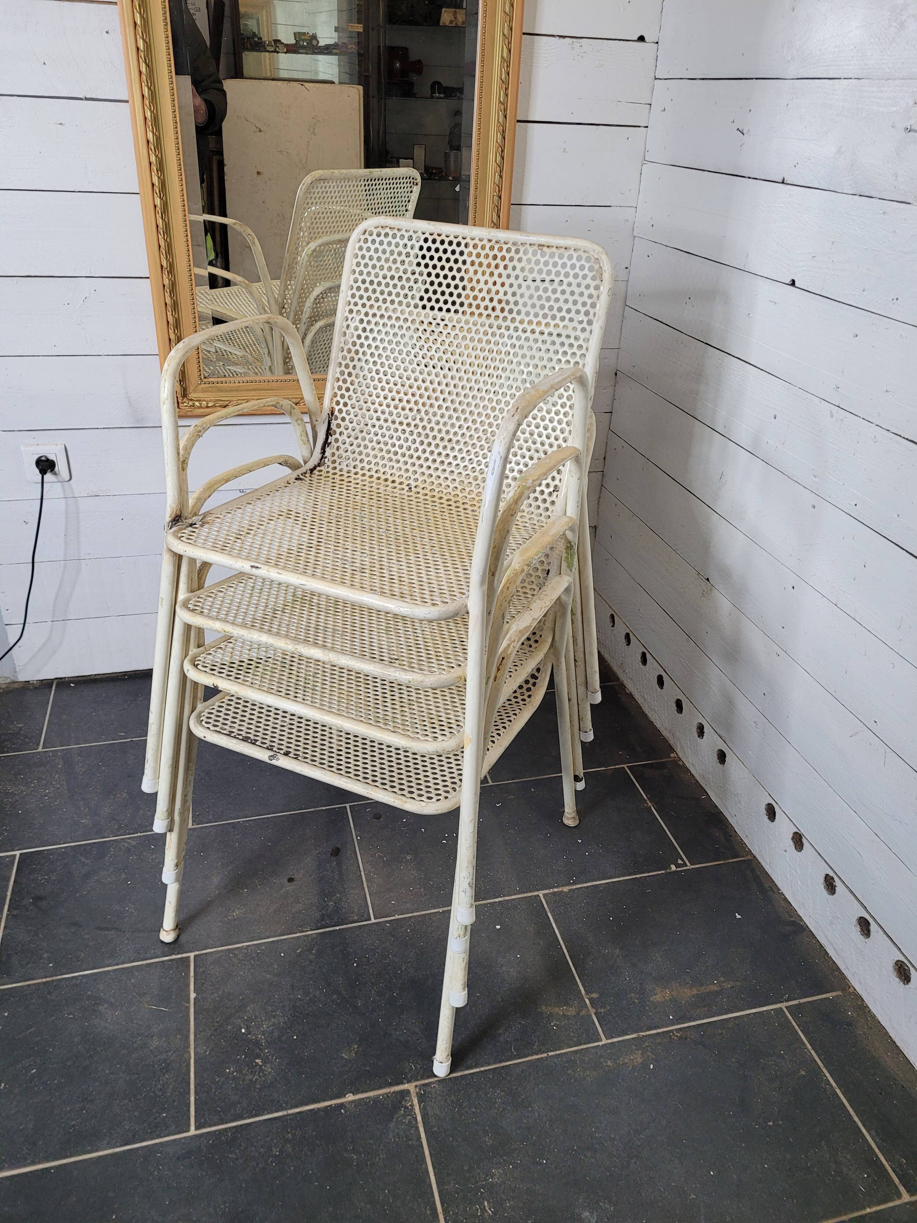 4 perforated metal garden armchairs